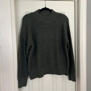 Gently worn olive green sweater